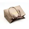 Enveloppe-cadeau en gros 500pcs / lot Taille de logo personnalisée Shopping avec ruban Bow Paperbag Packaging Boutique Sacs Matte