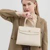 Bola elegante e versátil da primavera para mulheres - bolsa de passageiros da moda e minimalista com grande capacidade, ombro e desgaste de crossbody