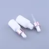 Urządzenia 10pcs 10 ml 15 ml 30 ml 50 ml 100 ml Pearl White Glass Olejki z olejku eterycznego butelki butelki kosmetyczne butelka z kroplowaniem