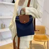 2024 Vintage Fashion Womens ryggsäckar Nya multifunktionella flickor Student School Ryggsäck Portable Travel Commute Handväska för kvinnlig 10A AZ