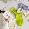 Femmes chaussettes de style coréen lettre de couleur sport de mode pour les filles respirant tube intermédiaire