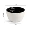 Koppar tefat svart kaffebönor vägning kopp exakt mätning delikat design