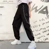 Kvinnors jeans lastbyxor Kvinnor Harajuku Pants Chain Pockets Joggers Kvinnor Byxor med hög elastisk midja Hip-Hop Safari Style Kvinnliga harembyxor Y240408