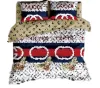 Set di biancheria da letto designer all'ingrosso set classico Letter Logo Khaki Dasched Letter Logo Stampato Copertina di copertura del piumone Copertina da 4 pezzi Set di cotone puro comodo decorazione di biancheria da letto comoda