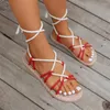 Sandales Rome Femmes Flats Summer Casual Slippers Chaussures marchant 2024 Cyy Lace Up Beach Flip Flops Slingback Slides Mujer