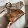 Sac 2024 Sadle des aisselles vintage de haute qualité Pu en cuir en cuir pour femmes sacs à main