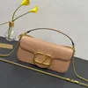 Bolsas de ombro de designers interruptores Glocks com corrente para mulheres Branha Bolsas de vaca de casos de bola de metal logotipo de fivela magnética Bolsa de embreagem Gold mini mini