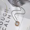 Varmförsäljning av rostfritt stål Tre ringhalsband Enkel och icke-blekande herr Hip-Hop Style Titanium Diamond Pendant Jewelry