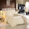 Set di biancheria da letto di lusso in stile principessa coreano beige inverno inverno inverno tessuto set fitto coperchio piumino foglio di gonna in pizzo