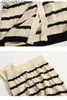 Spódnice w paski 2 -częściowe zestawy damskie wyprzedzenie damskie jesienne zima v szyja koreański sweter modny
