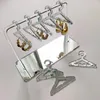 Sachets de bijoux 8 PCS HOSTERS HAPPORT HODDER MOGLOIRES Personnalisées Racks Display Racks Hanging Vêtements Stand Storage Organisateur Organisateur