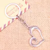 Keychains 20pcs mode Keychain 38x36 mm Corable Cœur Pendentif Diy Bijoux Car Key Chain Chain Ring Holder Souvenir pour cadeau