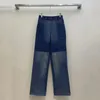 Женские джинсы контрастируют цветные лоскутные клады для женщин многосайновые дизайнерские джинсовые штаны с прямыми ногами весна 2024 модная шикарная брюк xx66