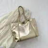 Kvällspåsar pu läder axel shoppare väska för kvinnor 2024 stora damer tote koreansk mode lyxdesigner kvinnliga handväskor guld silver