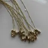 Hänghalsband bilandi mode smycken eleganta temperament bokstäver hänge halsband för kvinnor 2023 trend nya helt enkelt design tillbehör24040qrht