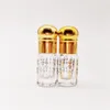 Bouteilles de rangement 10pcs / lot 3 ml bouteille attar avec bâton de compte-gouttes pour huile essentielle