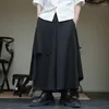 Męskie spodnie 5xl mężczyźni japońska odzież uliczna ciemna czarna splice moda luźna swoboda spódnica z szerokimi nogami kobiety gotyckie spodnie plus rozmiar
