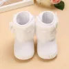 Stövlar 2021 Nytt varumärkes nyfödda barn Toddler Boy Girl Soft Sole Flower Bow Crib Shoes Warm Boots Prewalker 018m