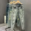 Trendy tiggare perforerade jeans män vår/sommar koreanska snäva fötter byxor elastiska ungdomar pi shuai nio poäng byxor