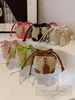 Ins Girls Straw Weaving Handväskor Kids Single Shoulder Drawstring Mini Bucket Bag Fashion Children Crossbody Bags Z7604