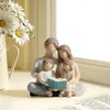 Decoratieve beeldjes Familie van 4 Leesboek Handgeschilderde figuren Geschenken voor ouders of dochter en zoon Home Decoratie