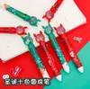 24pcs en gros des bois créatifs multicolores stylo à billes de Noël paillettes de Noël à 10 couleurs de papeterie cadeaux