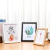 Frames Cadre PO en bois pour mur suspendu A4 Wood Picture Stand Pictures Pictures Commémoratives Cadeau 6 pouces 8 pouces 10 pouces