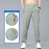 Pantalon masculin masculin zipper poche extension décontractée droite lâche mince respirant pantalon de sport printemps d'été élastique