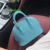 Bolide Leder Handtasche vertrauen Sie luxuriöse Frauenbeutel neue Lederschalen -Tasche Frauen Messenger -Tasche Netz rot Mini Bowling Leder Tiktok Tasche Have Logo Hb1yni