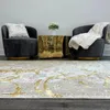 Carpets Penina Luxury Area Rug em bege e cinza com círculos dourados Design abstrato