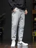 Jesienne męskie spodnie do joggera duże rozmiary odzieży sportowe kieszenie Szczupłe szare spodnie dresowe bawełniane spodnie dla mężczyzn 8xl 240329