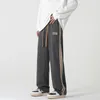 Pantalon masculin Side Striped Jame pour hommes Vêtements de rue Corée Fashion décontractée coréenne lâche jogging Sports en cours de survêtement