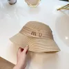 Sunshade Designer Bucket Hat Metal Letter Fashion Straw Hat Elegant Silk and Hemp Ribbon Decoration Beach Hats