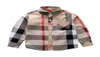 Vêtements pour enfants de mode 38y de printemps Nouveau manche longue grande plaid t-shirt motif de marque banc de boy