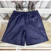 Nouveau short masculin Brand de mode d'été Shorts sportifs décontractés pour hommes Fashion européenne respirant légèrement lâche Pantalon de plage à cinq points