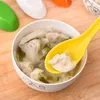 Cucchiai melamina gancio cupola cupola zuppa di miele porridge scoop tavoli colorati casuali miscelati