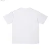 Mäns avslappnade skjortor mode märken ny produkt för sommaren 2024 lila märke bläck stänk ängel tryck lös kortärmad fett t-shirt yq240409
