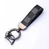 Creative Ring Pattern Leather Waist Hanging Car Metal Pendant for Men and Women Keychain Small Gift