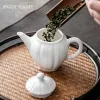Porcelaine blanche en porcelaine blanche de haut niveau Xishi Filtre à thé en céramique à la main