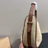 Lyxig handväska designer crossbody halm stickad axelväska för kvinnor triangel märker läder kvinnliga modeväskor dam cross body halv månpåse