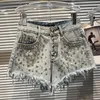 Y079 Summer New Cool Big Grein Water Water Diamond craved Greated Fringe Edge Denim Shorts para mulheres