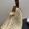 Lyxig handväska designer crossbody halm stickad axelväska för kvinnor triangel märker läder kvinnliga modeväskor dam cross body halv månpåse