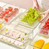 Opslagflessen stapelbare scherper gesloten voedselkoeling Hoge transparantie hoge transparantie verse huishoudelijke producten koelkastkast