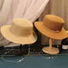 Zomer elegante parelketen platte zon hoeden voor vrouwen chapeau feminino stro hoed panama brede rand antiuv strand cap meisje tope240409