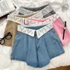 Stile designer di jeans femminile 2024 Summer Fashion Streetwear Torn Waist Over Crystals perline Shorts Donne Donne