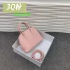 Bolide Leder Handtasche vertrauenswürdige Luxus Frauenbeutel 2024 Neue Top -Layer -Kuhspannwurzel Litchi Muster Mini kleine Taschenschalenbeutel Süßigkeiten Farbe halbe Schulter haben Logo Hb9aki