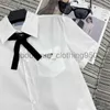 Kvinnors T-shirtdesigner T-shirt 24 Tidig vårsamling Inverterad triangel Bow Embelling Reduced Halsring Polo Kort ärmskjorta Toppar Tees Tees
