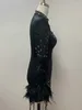 Abiti casual Donne Donne inverno sexy cristallo strass piuma abito nero a maniche lunghe 2024 Elegante festa serale per esibizioni