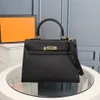 Luxurys Top Handle Designer Sac à bandoulière Bouetchette pour femmes enveloppe crossbody coquille sac à main