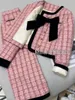 Robes de travail printemps deux pièces françaises petit parfum automne et hiver tweed plaid dames arc arc court manteau haute jupe